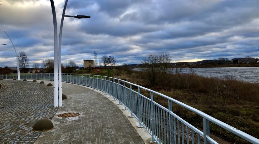 The promenade on Bruģu Street on the bank of the Daugava River